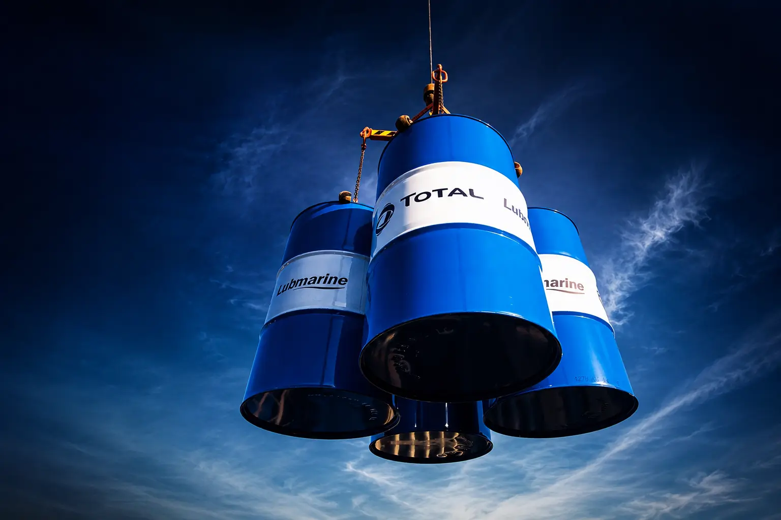 Total Lubmarine lubricant drums being lifted for marine supply